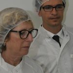 Semiconductor cleanroom engineers working on silicon wafer production lines